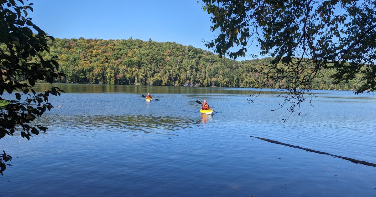 two kayakers on a lake | Haliburton Forest & Wildlife Reserve: Video Review