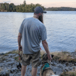 man and dog standing looking out at the lake | Fairbank Provincial Park: Video Review